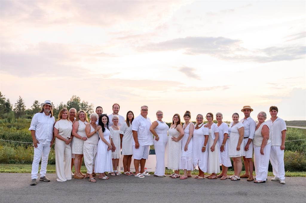 group of long table dinner attendees